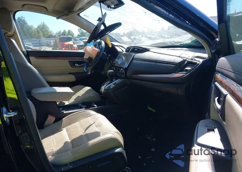 2018 Honda Cr-V Touring z USA, uszkodzony, nr VIN 7FARW2H94JE099983